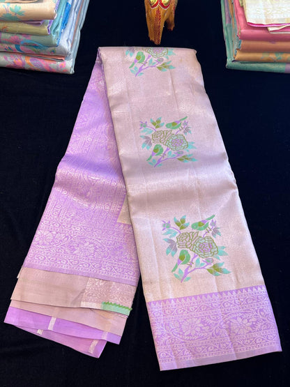 Pastel pattu saree with Menakari weaving peacock design