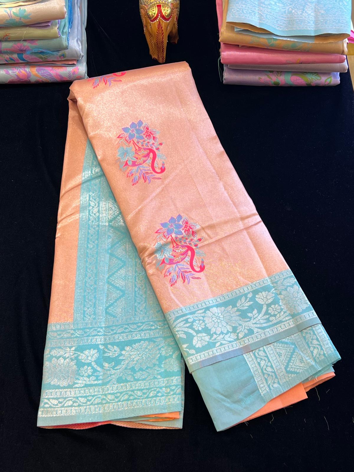 Pastel pattu saree with Menakari weaving peacock design