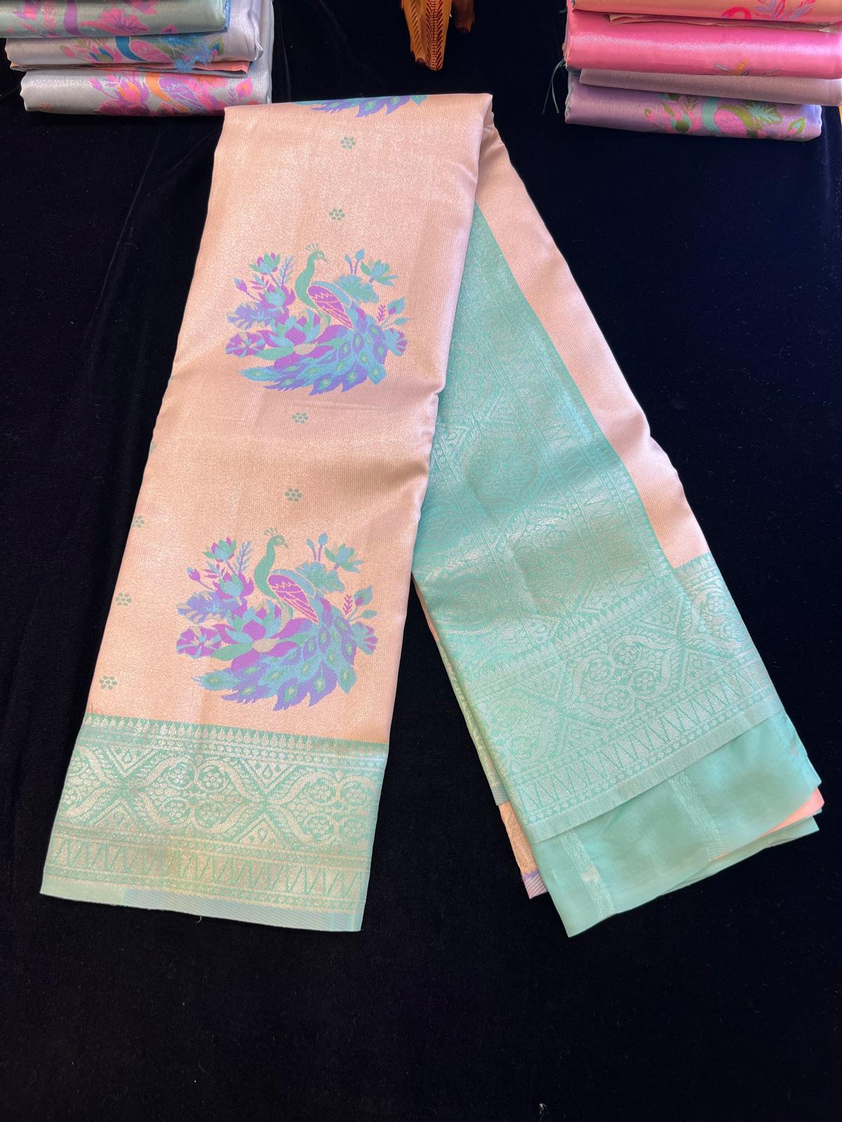 Pastel pattu saree with Menakari weaving peacock design