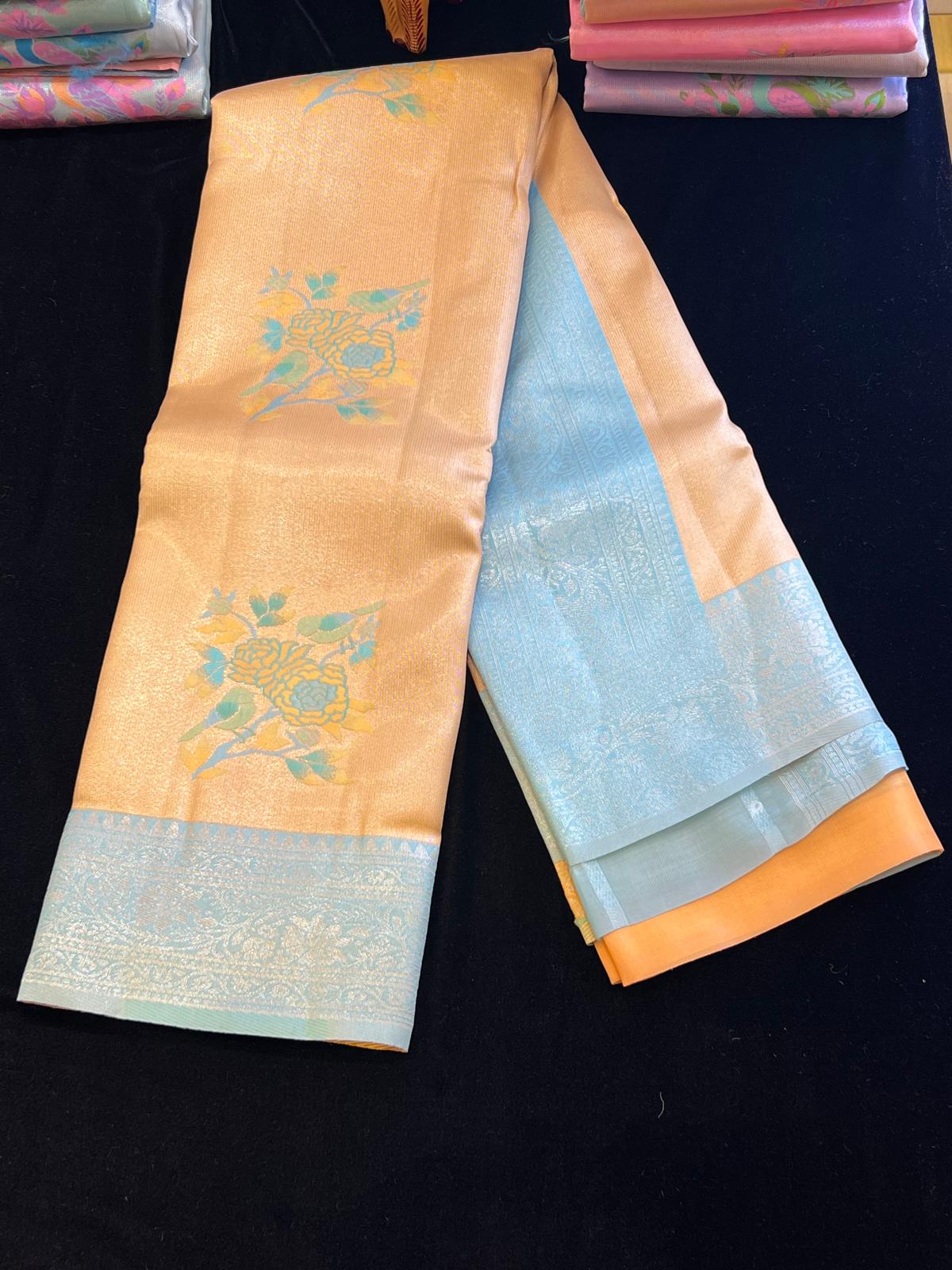 Pastel pattu saree with Menakari weaving peacock design