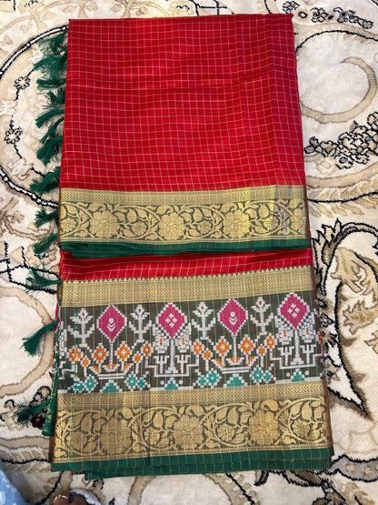 Dola check with Ikkat Border sarees