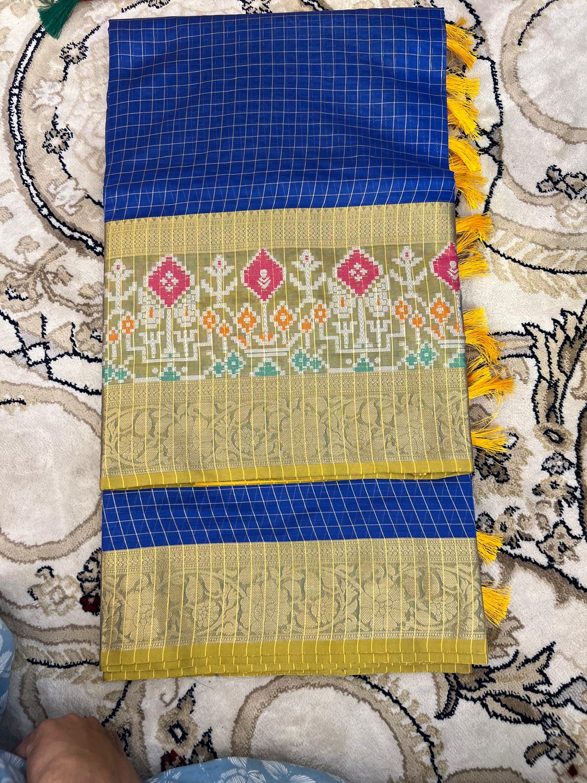 Dola check with Ikkat Border sarees
