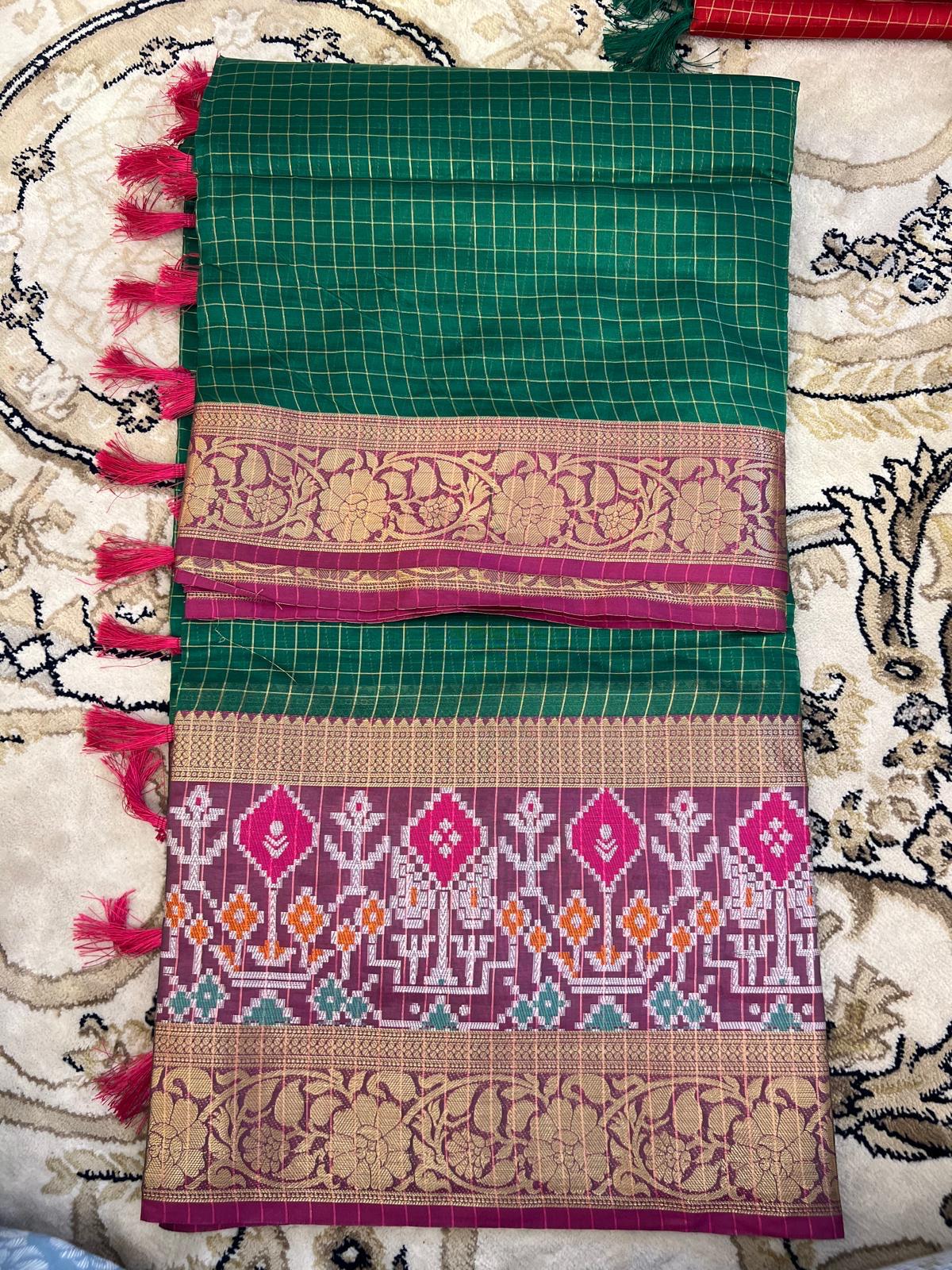 Dola check with Ikkat Border sarees