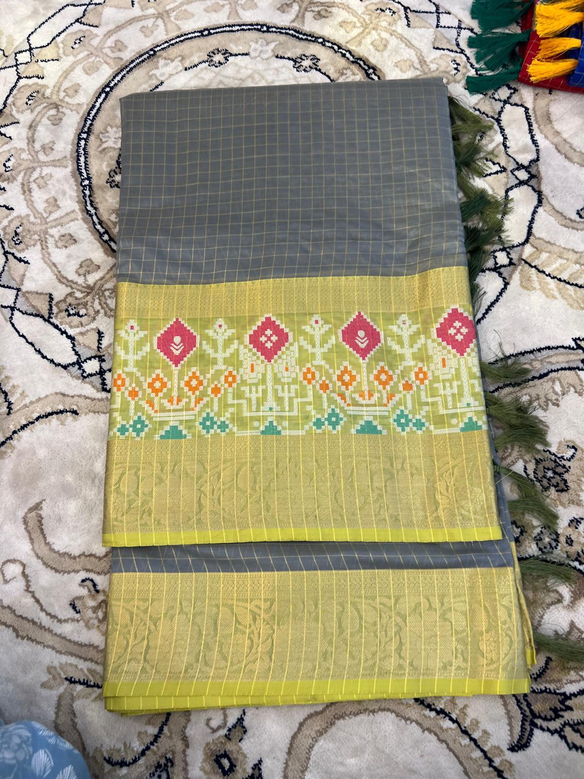 Dola check with Ikkat Border sarees